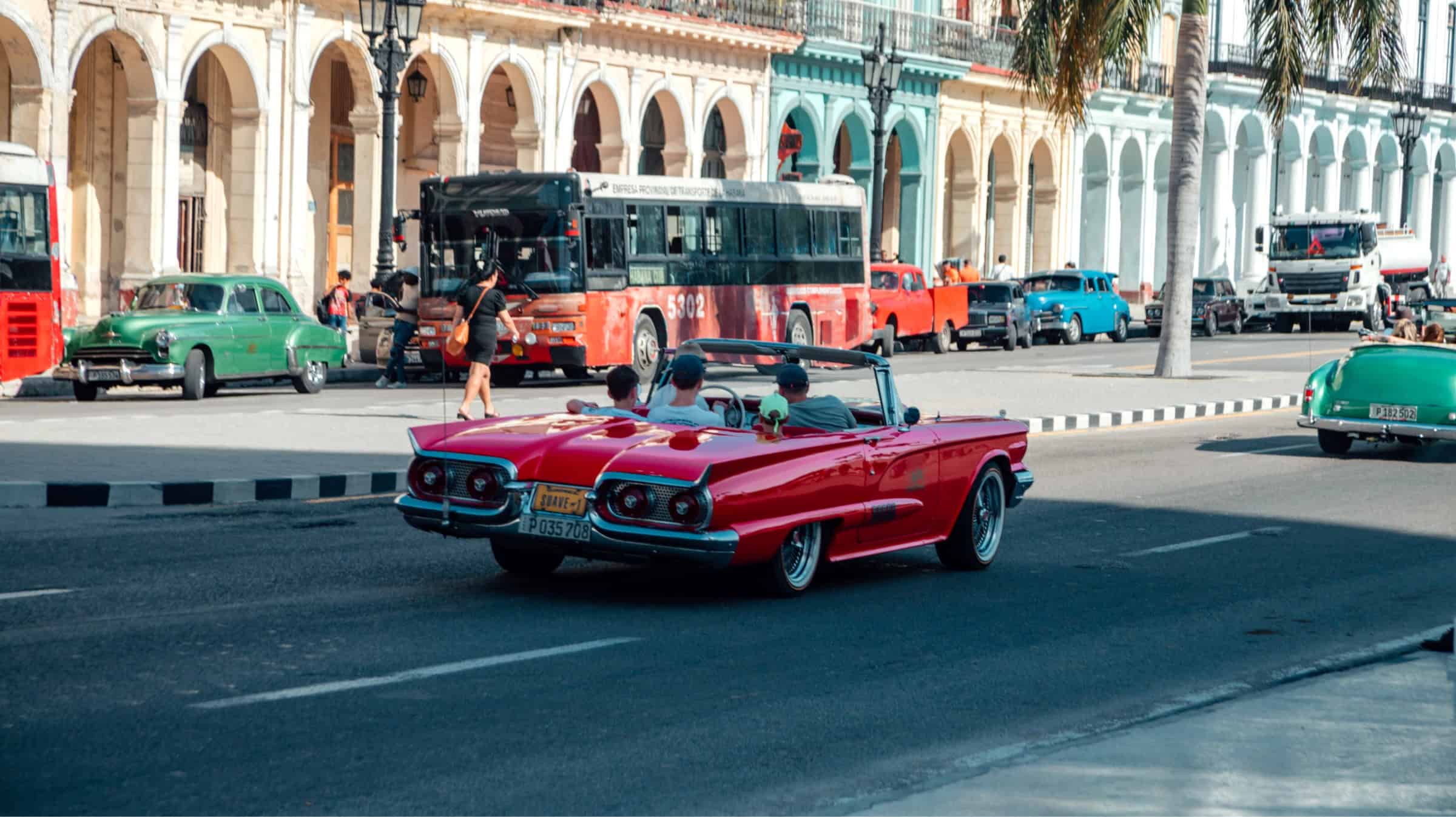 Old American classic Car driving down the Malecon , Old Havana 